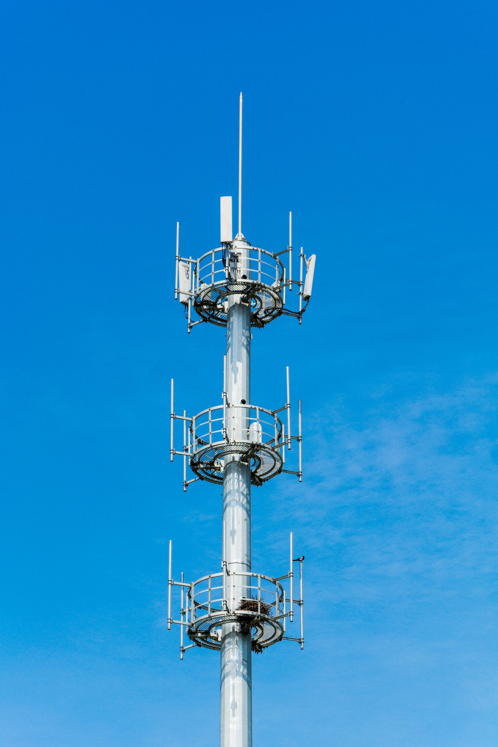 Communications tower with a beautiful blue sky